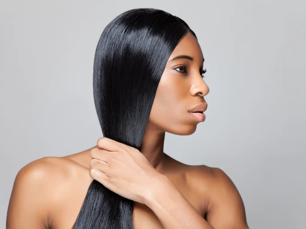 Black women can have naturally straight hair due to ancestral genetic traits