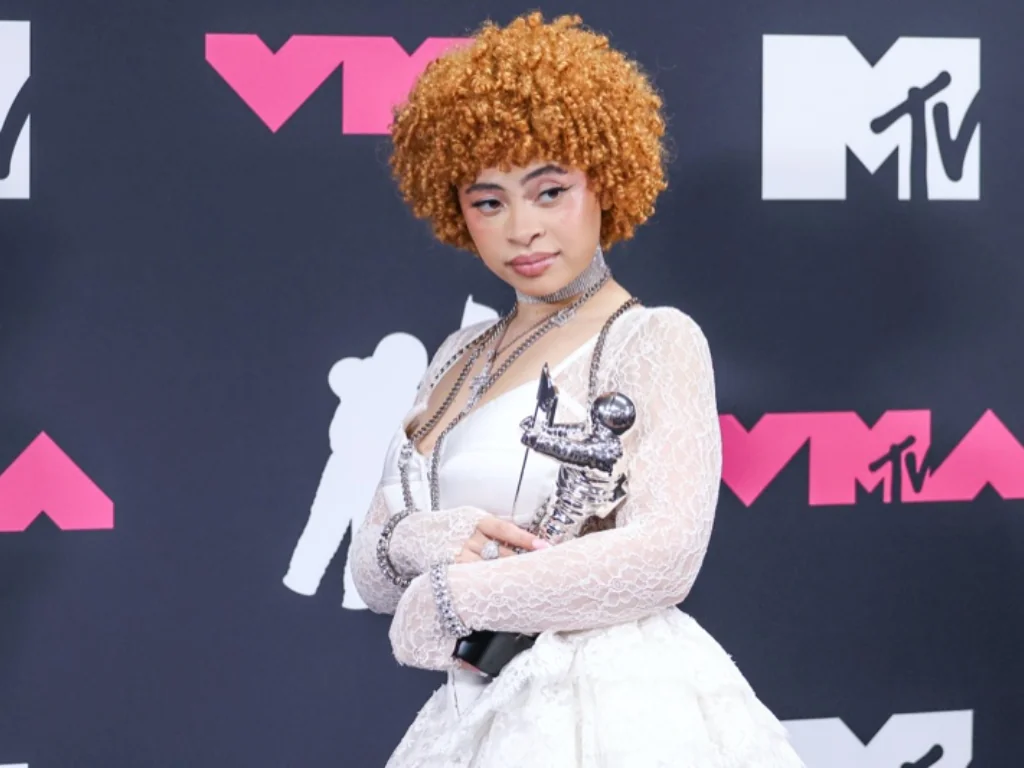 Her vibrant orange or ginger curly bob stands as Ice Spice's most iconic