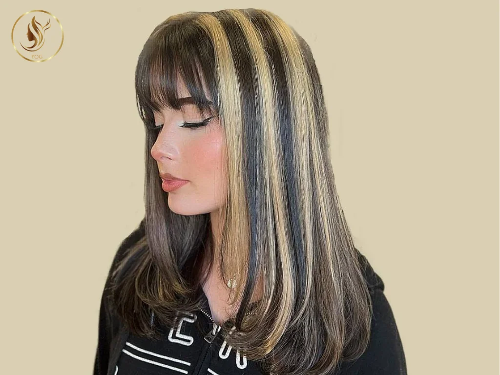 Skunk Stripe Hair: Bold Hair Trend Making a Major Comeback 2 Skunk stripe hair is a distinctive two-tone hairstyle